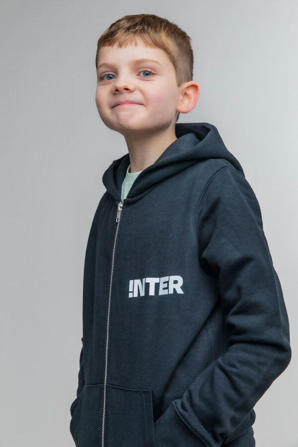 Pic of a boy wearing a black inter hoodie